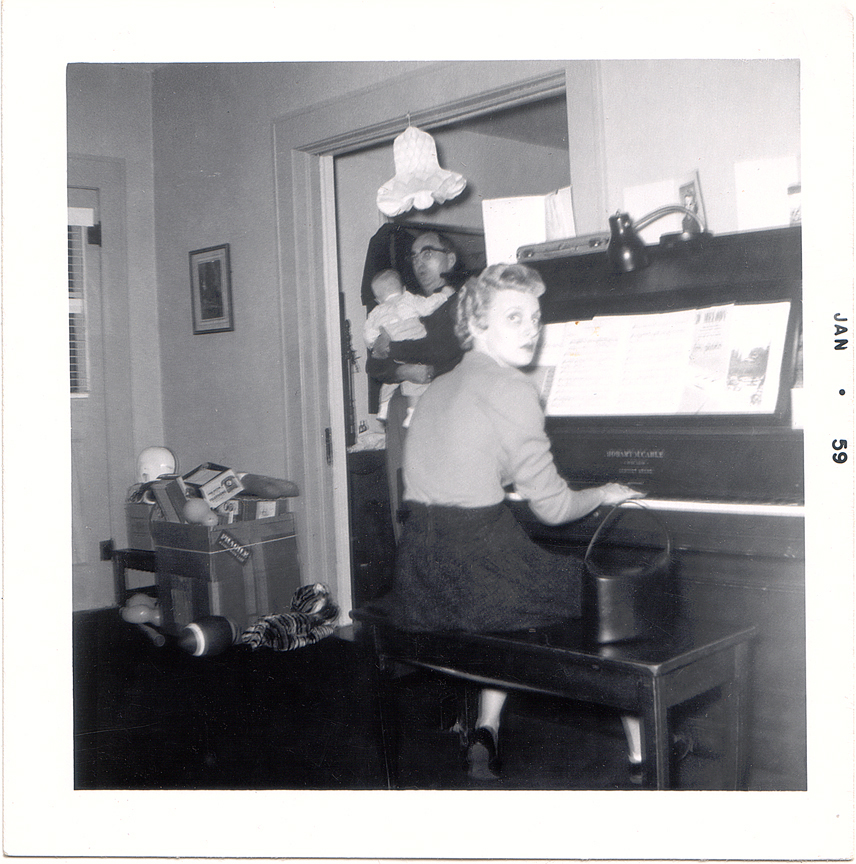Karen at the keys, Christmas 1955